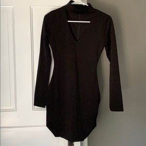 Black tight fitting keyhole dress